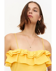 COMPAÑIA FANTASTICA TOP CON VOLANTE AMARILLO