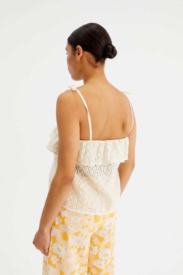 COMPAÑÍA FANTÁSTICA TOP DE CROCHET CON LAZO BLANCO