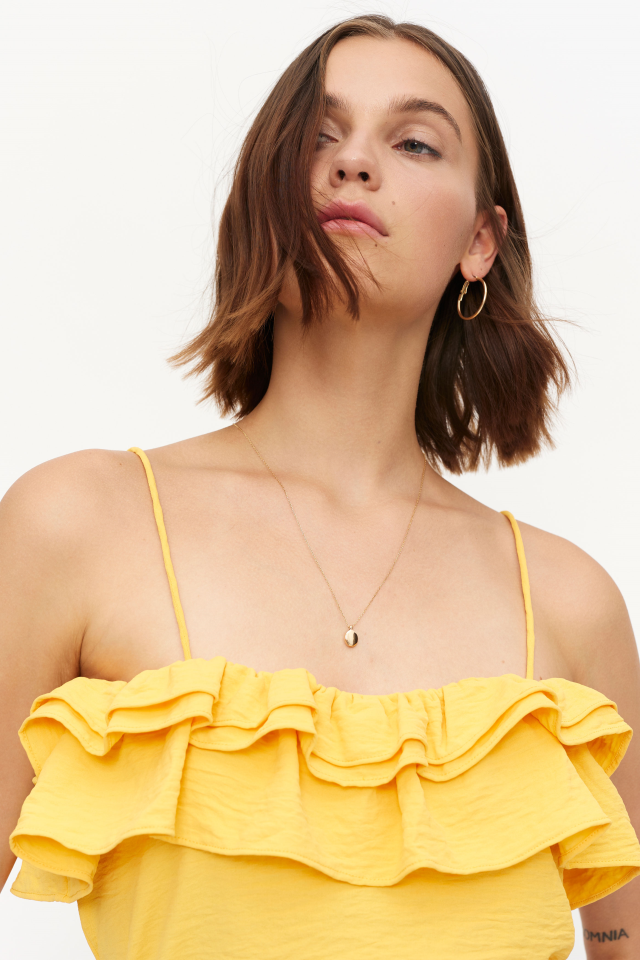 COMPANIA FANTASTICA TOP CON VOLANTE AMARILLO