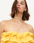 COMPANIA FANTASTICA TOP CON VOLANTE AMARILLO