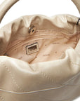 GUESS AMYS DRAWSTRING CROSSBODY SIMPLY TAUPE