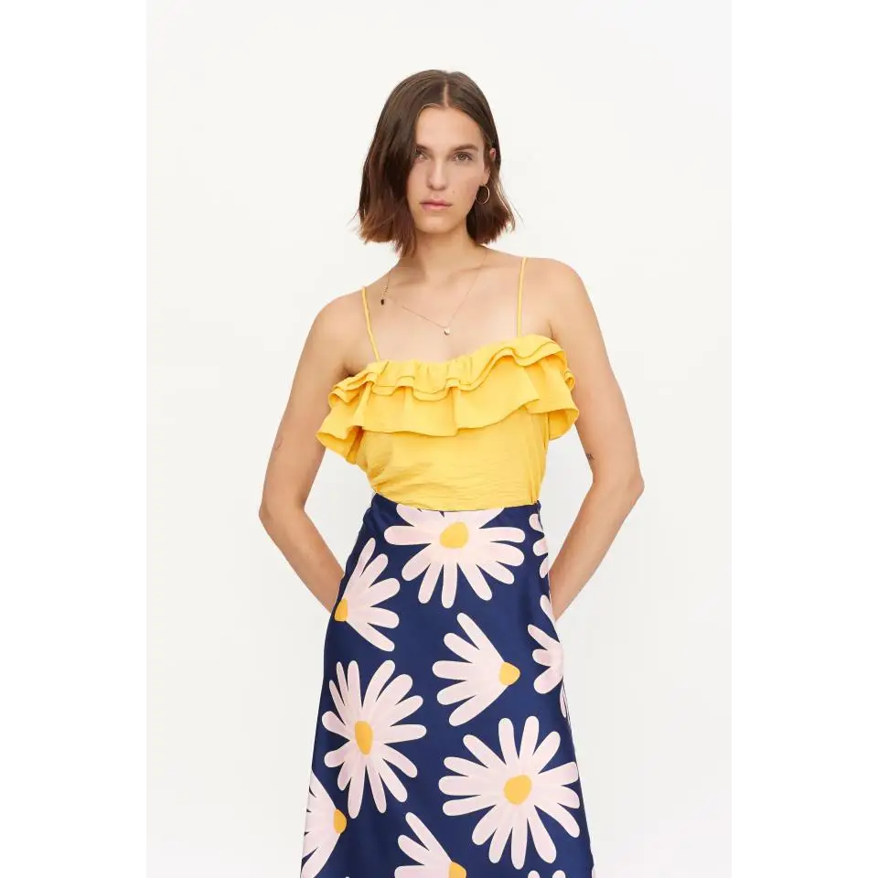 COMPAÑIA FANTASTICA TOP CON VOLANTE AMARILLO