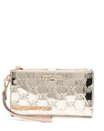 MICHAEL KORS JET SET WRISTLET PALE GOLD